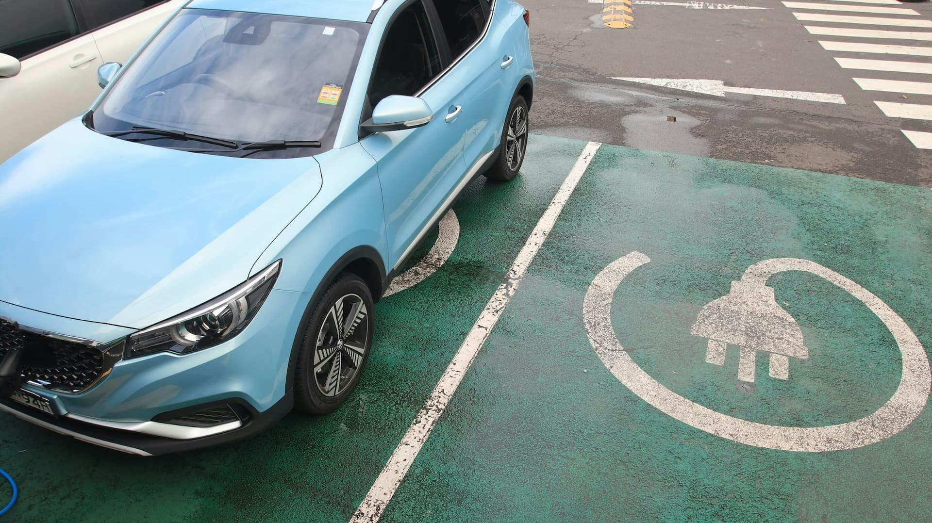 MG ZS EV parked on green charging space