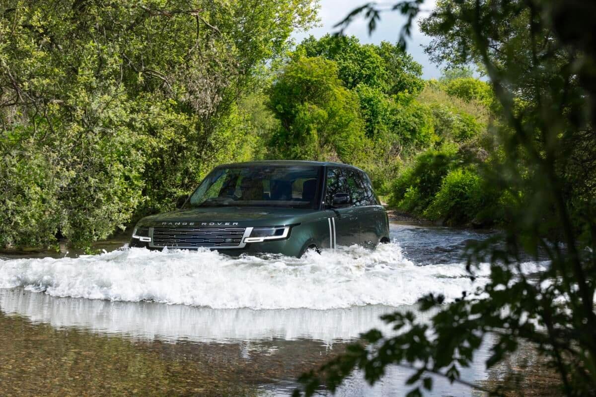 Range Rover Electric wading through deep water Range Rover Electric wading through deep water
