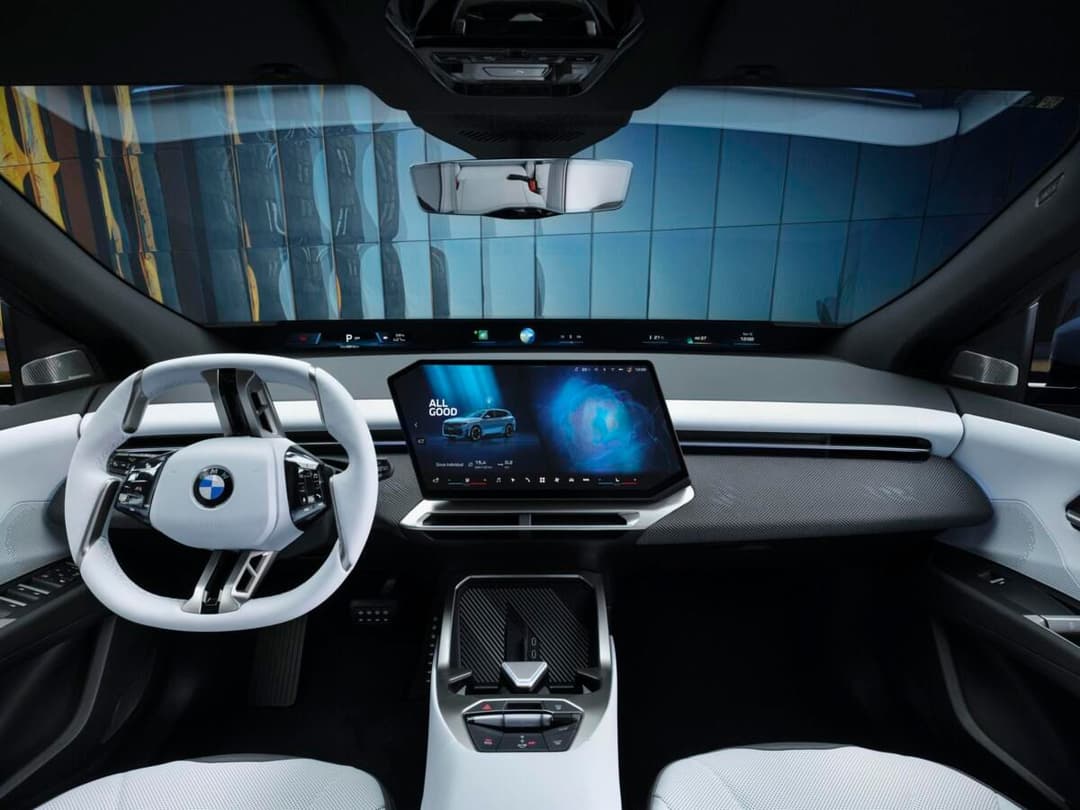 2026 BMW iX3 interior showing Panoramic Vision dashboard display 2026 BMW iX3 interior showing Panoramic Vision dashboard display