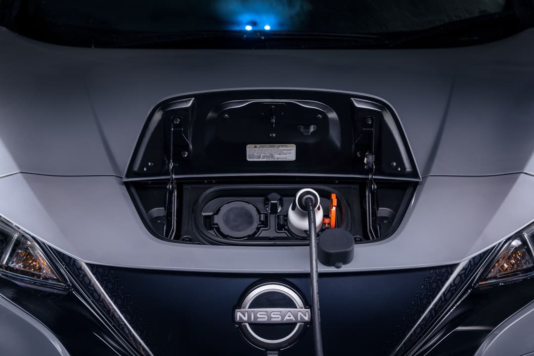 2023 Nissan Leaf front charging port plugged into Type 2 cable 2023 Nissan Leaf front charging port plugged into Type 2 cable