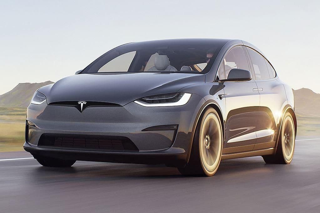 Grey Tesla Model X Plaid on the road Grey Tesla Model X Plaid on the road