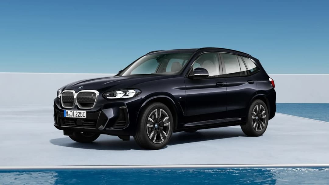 2024 BMW iX3 white landscape background angled front view 2024 BMW iX3 white landscape background angled front view