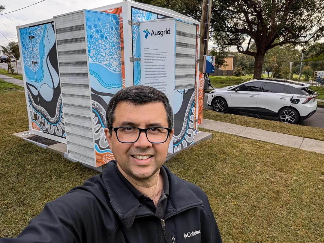 Neerav Bhatt at Australia's first co-located community battery and EV charger Neerav Bhatt at Australia's first co-located community battery and EV charger