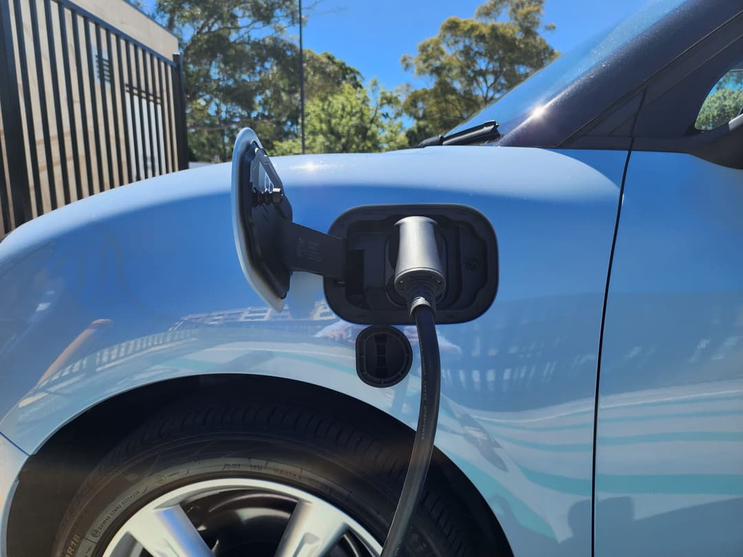 GWM Ora charge port located on the passenger side behind the front wheel GWM Ora charge port located on the passenger side behind the front wheel