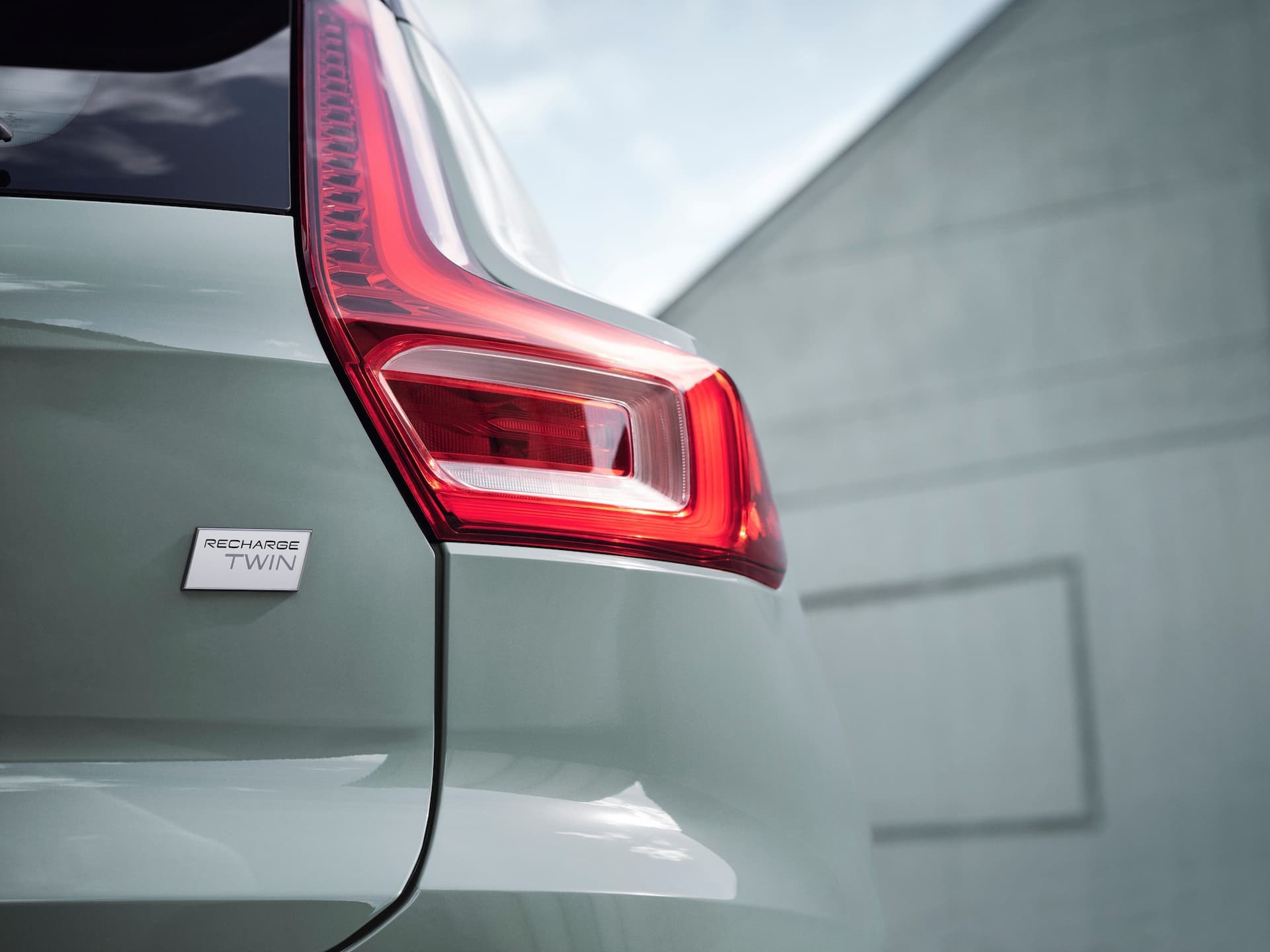 Sage Green Volvo XC40 Recharge rear tail-light with 'Recharge Twin' badge Sage Green Volvo XC40 Recharge rear tail-light with 'Recharge Twin' badge