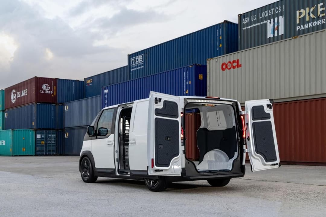 Kia PV5 Cargo interior cargo bay with barn doors open Kia PV5 Cargo interior cargo bay with barn doors open