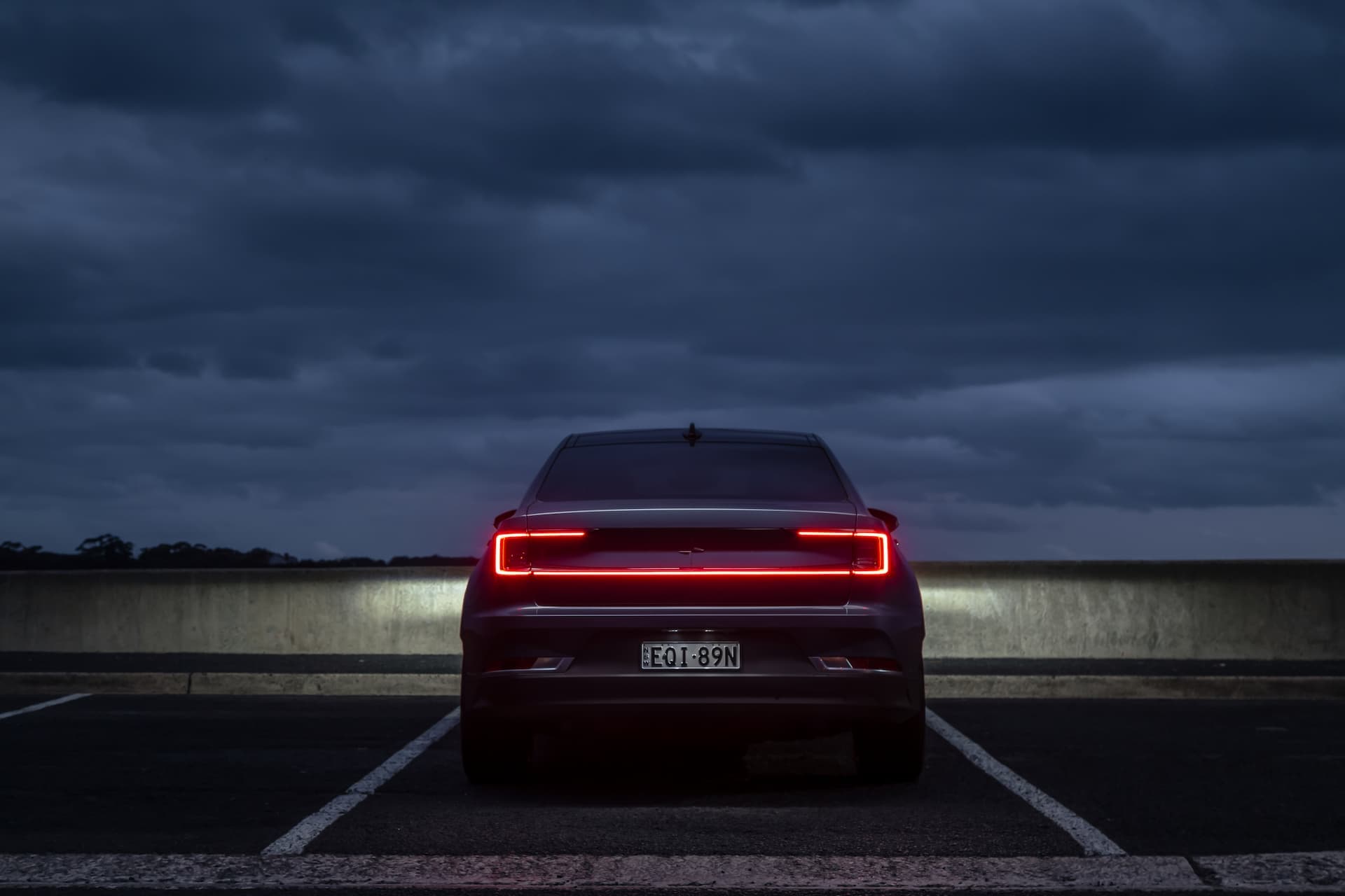 Polestar 2 rear LED light bar at night Polestar 2 rear LED light bar at night