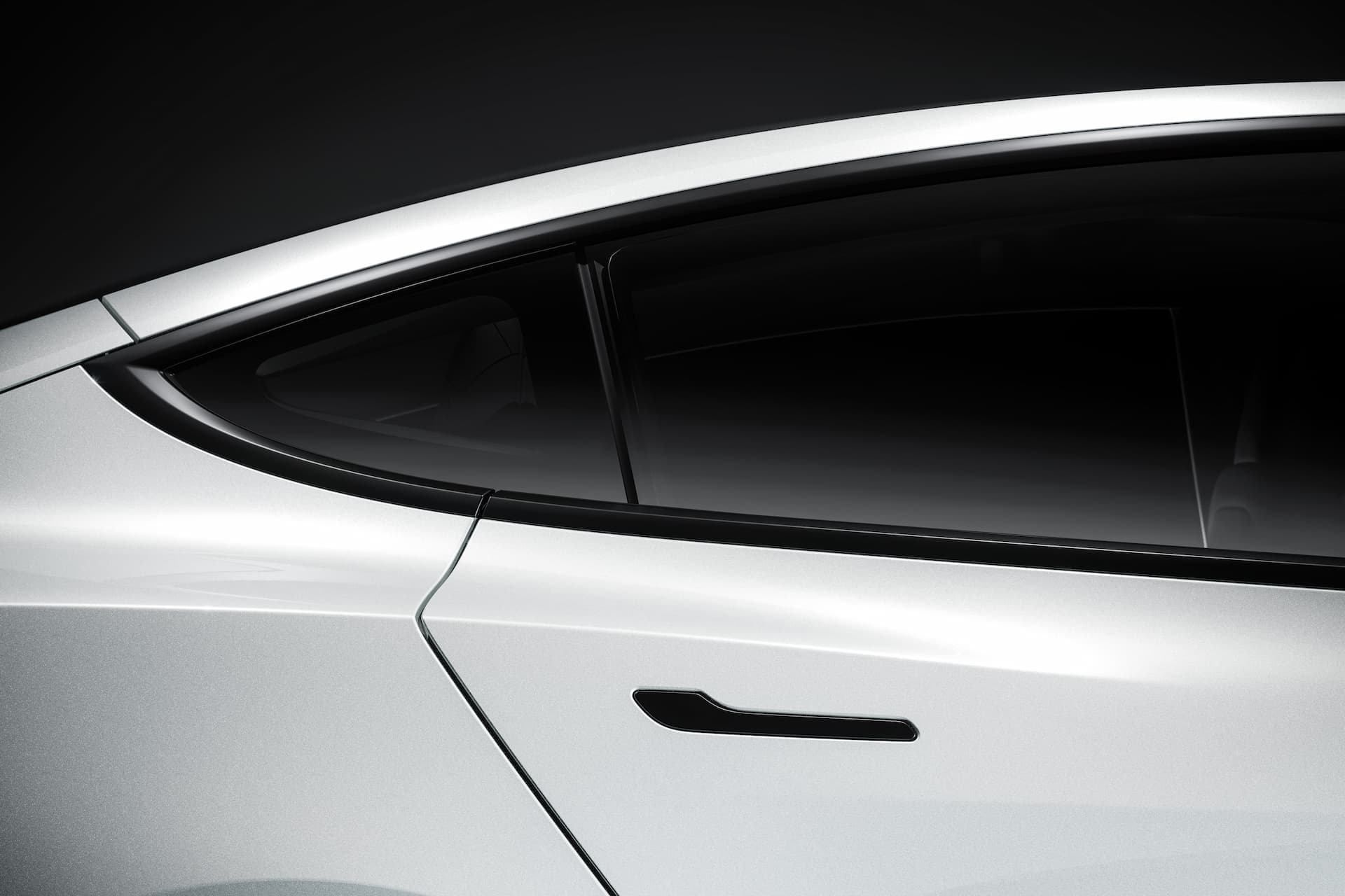 White Tesla Model 3 flush door handle and C-pillar White Tesla Model 3 flush door handle and C-pillar