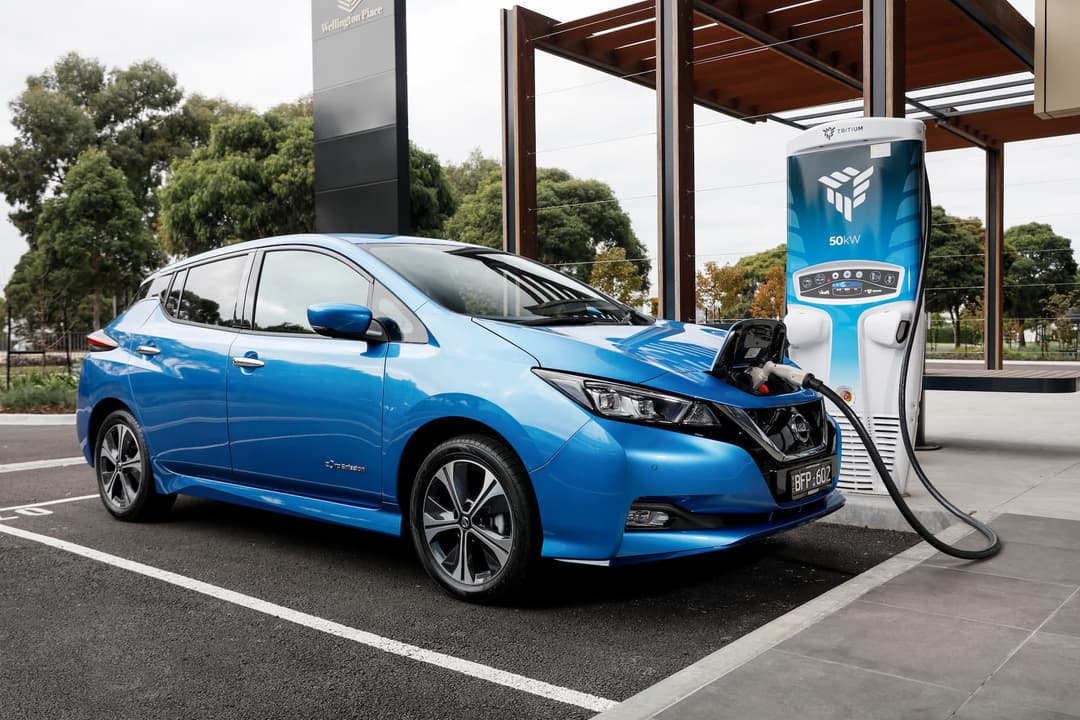 Blue Nissan Leaf electric hatch charging at Tritium RT50 Blue Nissan Leaf electric hatch charging at Tritium RT50