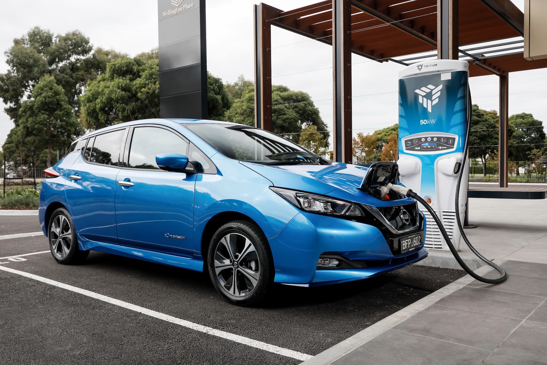 Blue Nissan Leaf electric hatch charging at Tritium RT50 Blue Nissan Leaf electric hatch charging at Tritium RT50