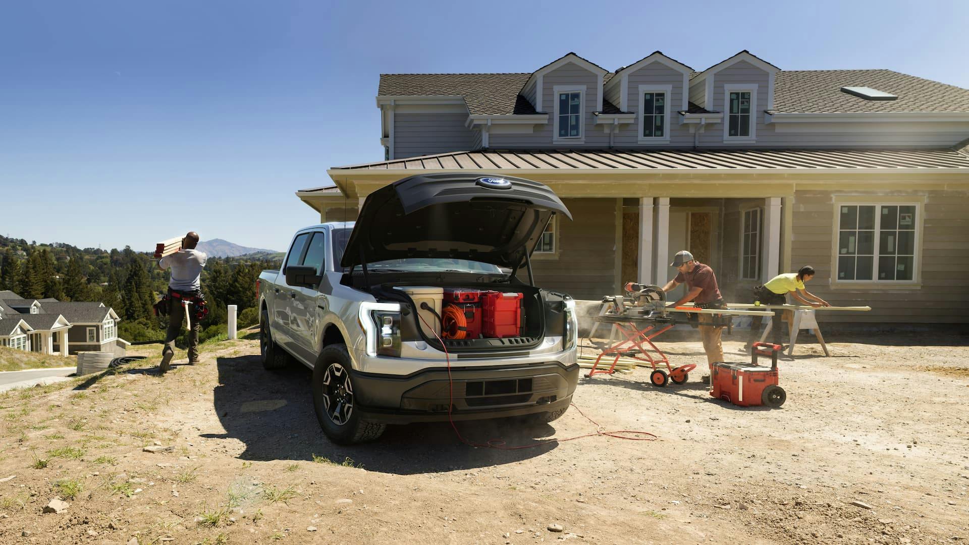 Ford F-150 Lightning powering a worksite using V2L outlets from frunk
