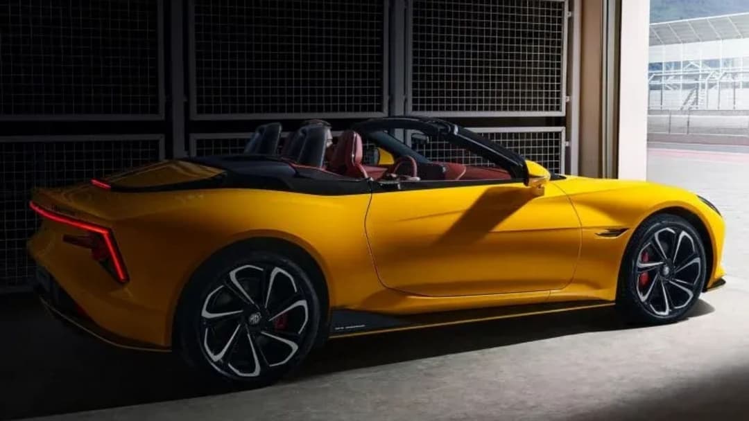 MG Cyberster in yellow parked indoors rear quarter view MG Cyberster in yellow parked indoors rear quarter view