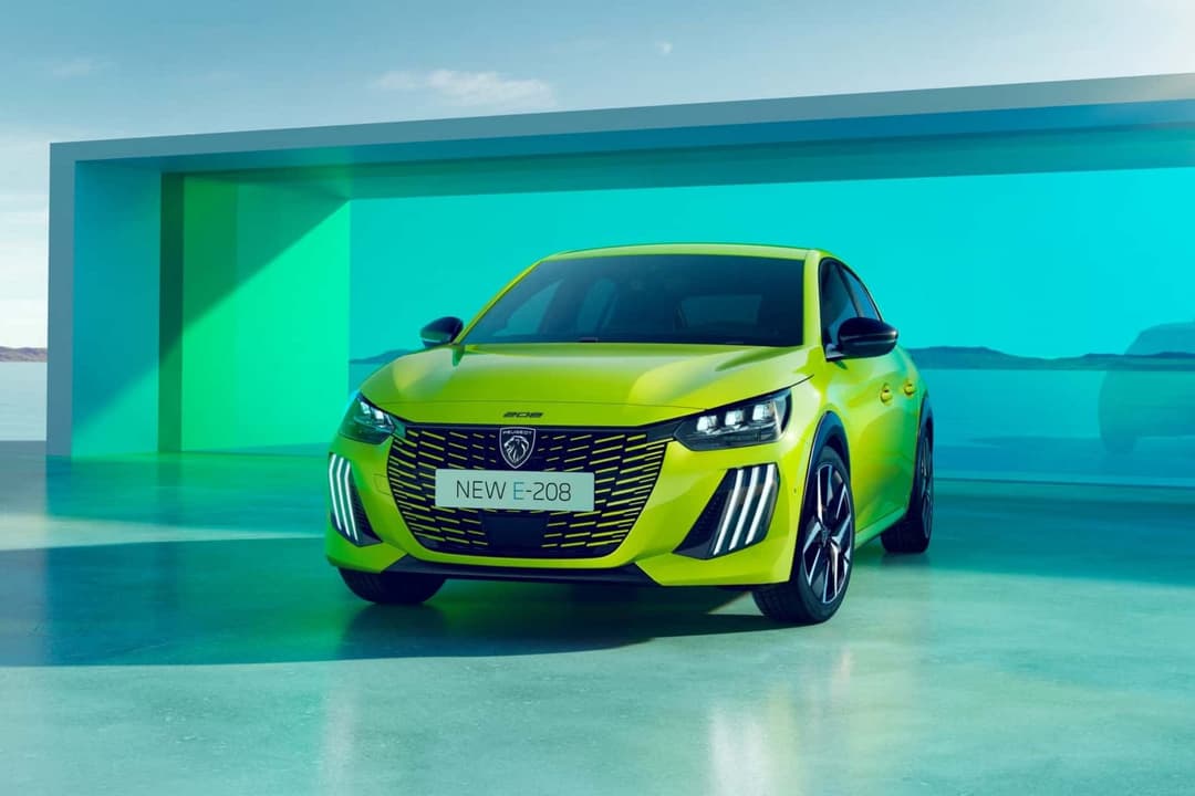 Peugeot e-208 front view in lime green Peugeot e-208 front view in lime green
