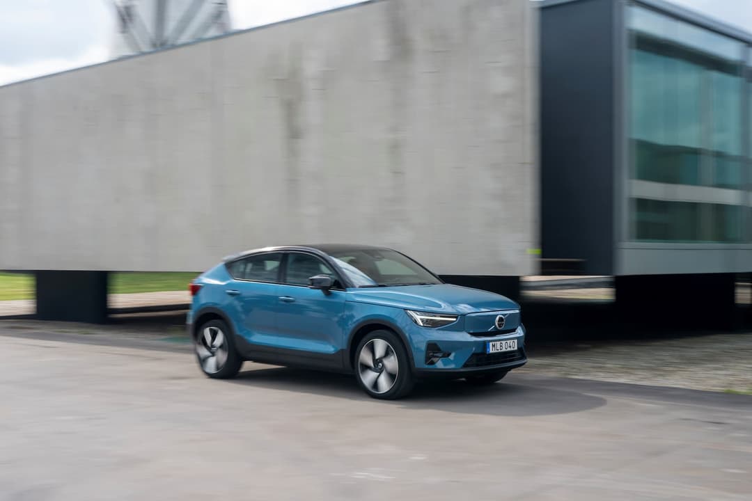 Blue Volvo C40 Recharge driving Blue Volvo C40 Recharge driving
