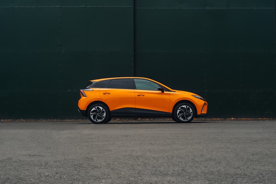 Orange MG4 side view Orange MG4 side view