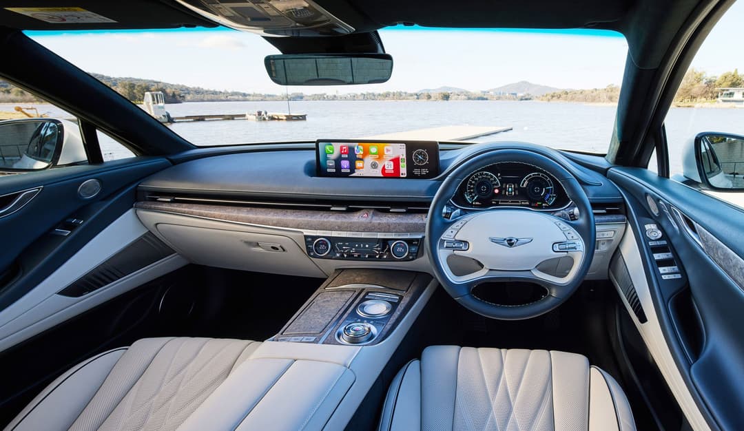 Genesis Electrified G80 white interior with forged wood Genesis Electrified G80 white interior with forged wood