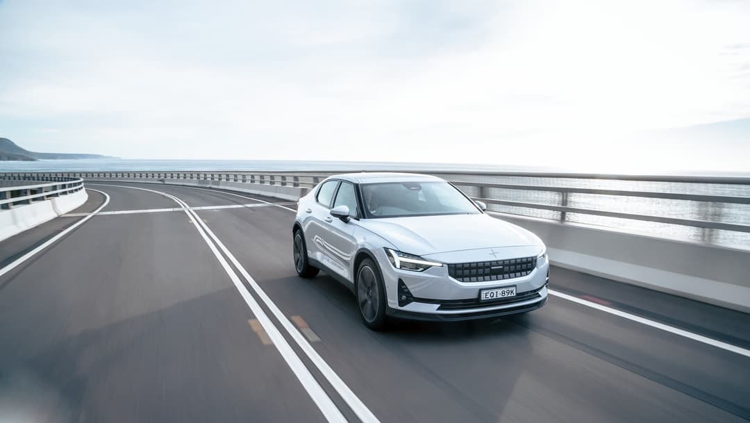 White Polestar 2 driving in Australia White Polestar 2 driving in Australia