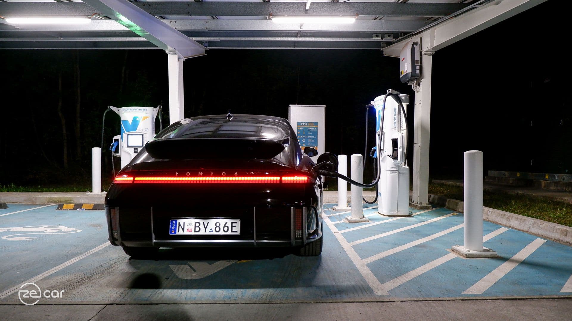 Hyundai Ioniq 6 charging at ultra-rapid Evie Networks station during night Hyundai Ioniq 6 charging at ultra-rapid Evie Networks station during night
