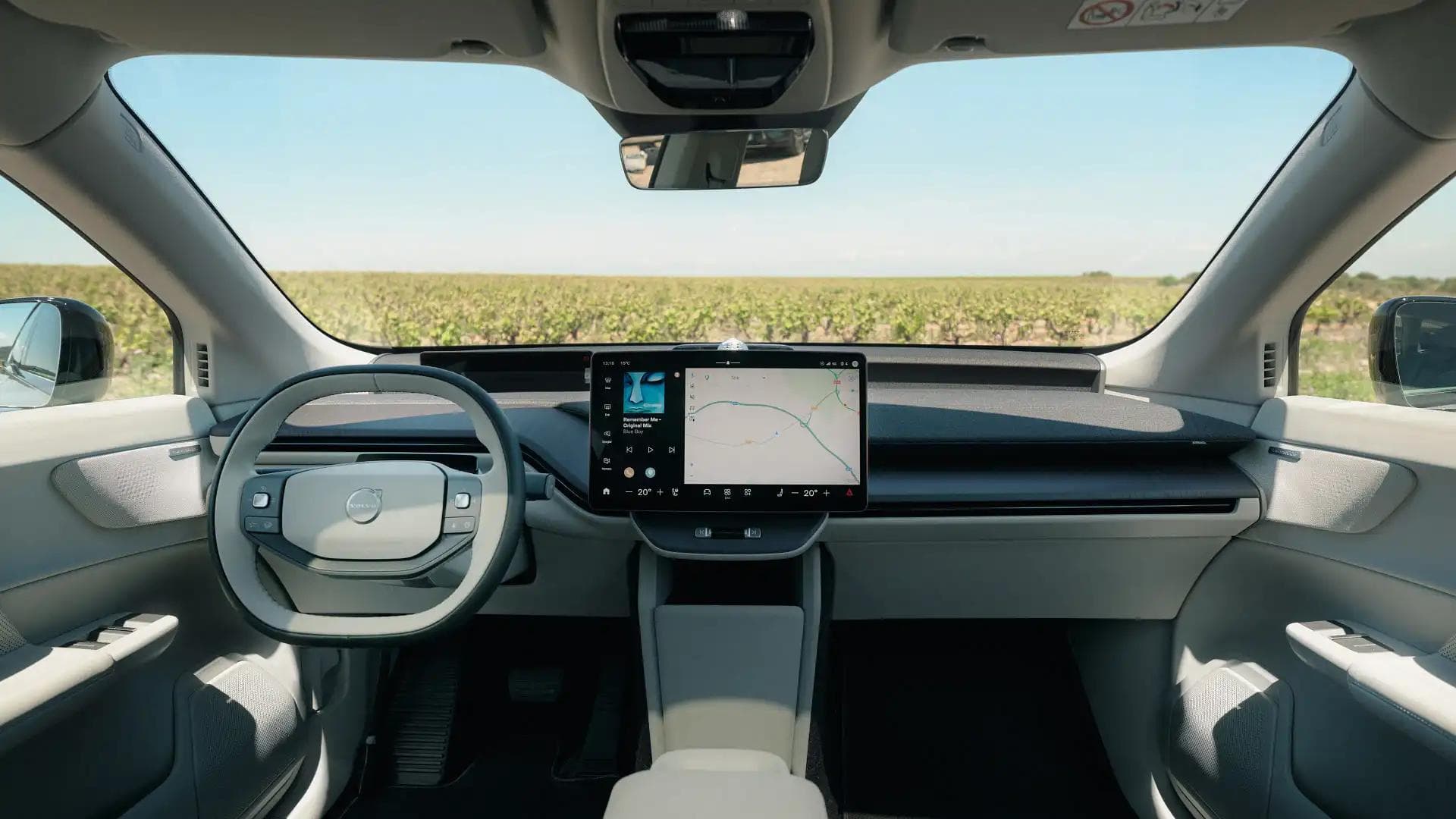 2027 Volvo EX60 interior dashboard view showing 15-inch touchscreen with Google Maps 2027 Volvo EX60 interior dashboard view showing 15-inch touchscreen with Google Maps