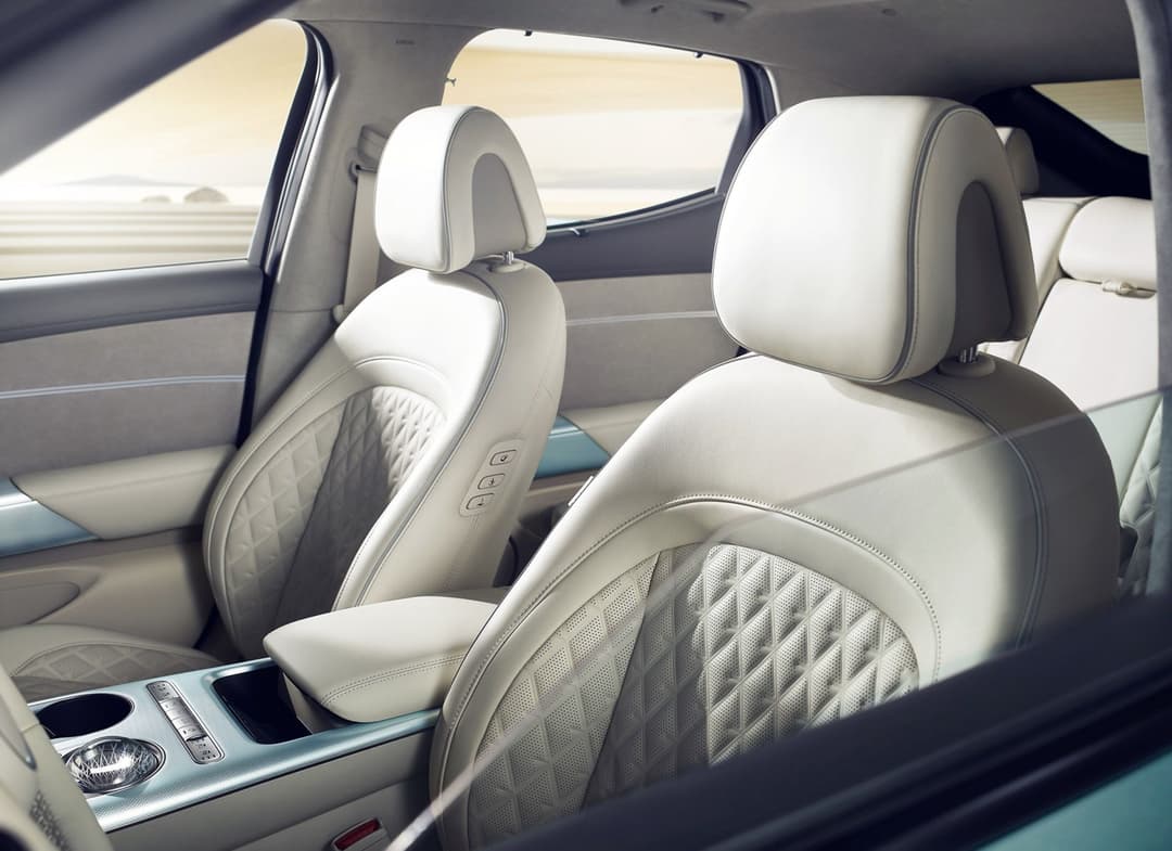 Ash Grey and Glacier White Genesis GV60 nappa leather front seats interior Ash Grey and Glacier White Genesis GV60 nappa leather front seats interior
