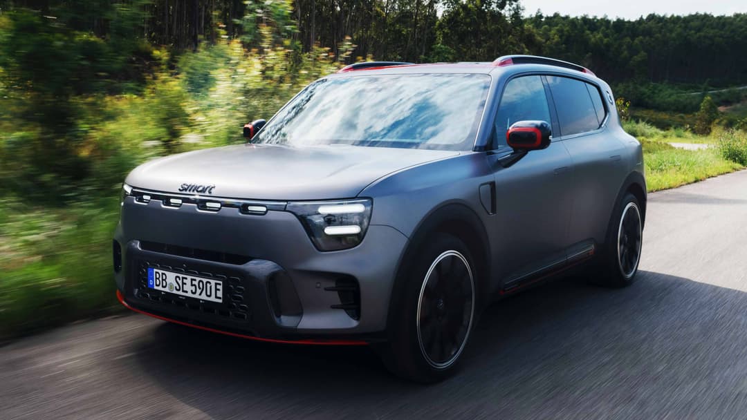 Smart #5 electric SUV interior dashboard showing dual digital displays, steering wheel, and modern cabin design with premium materials Smart #5 electric SUV interior dashboard showing dual digital displays, steering wheel, and modern cabin design with premium materials