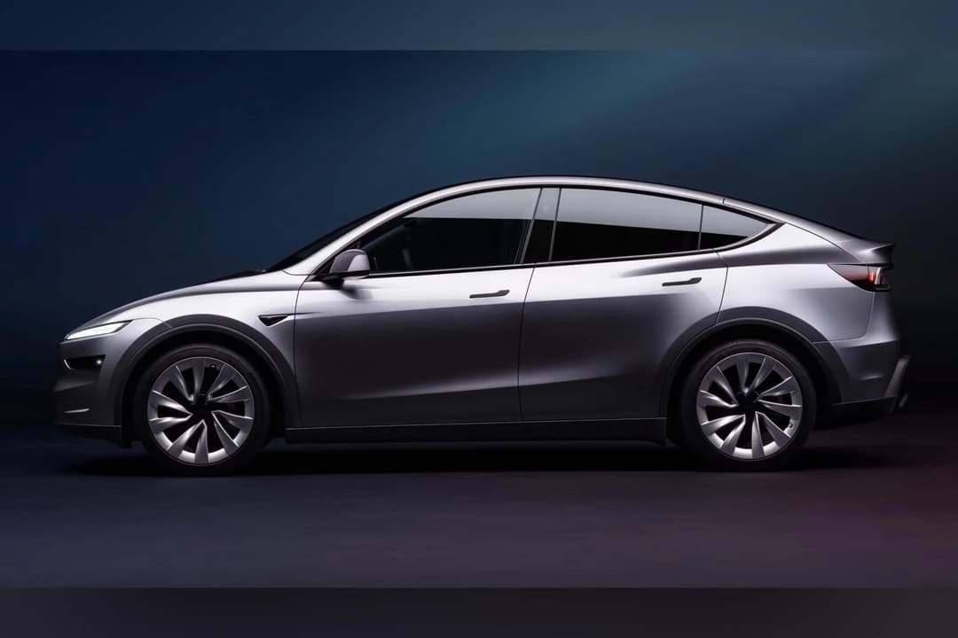Grey Tesla Model Y side view Grey Tesla Model Y side view
