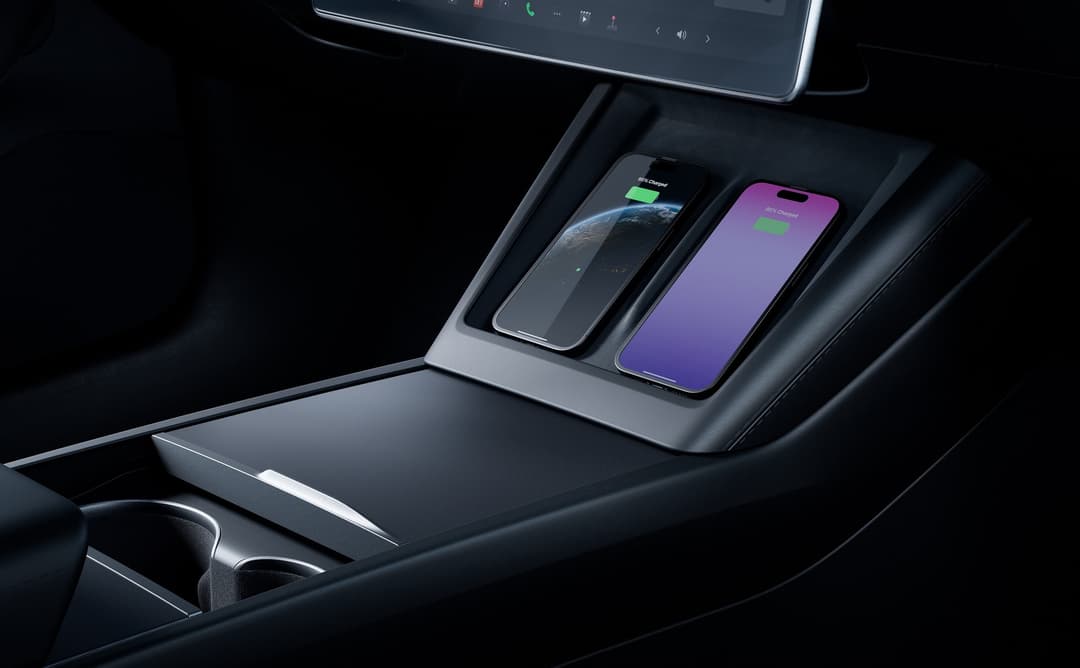 Tesla Model 3 driving in snow and centre console