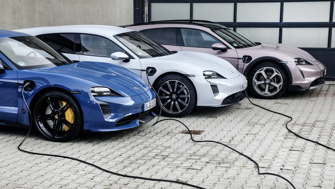 Three Porsche Taycan's connected to V2G plug Three Porsche Taycan's connected to V2G plug