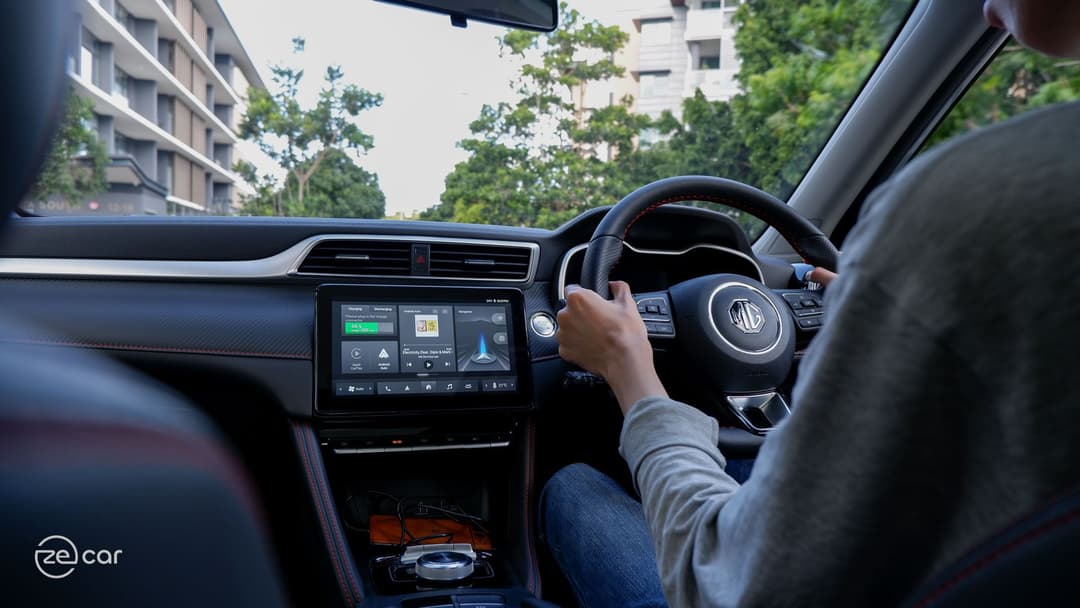Man driving MG ZS EV interior view Man driving MG ZS EV interior view
