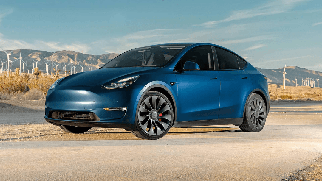 White Tesla Model 3 Performance charging with home wallbox White Tesla Model 3 Performance charging with home wallbox