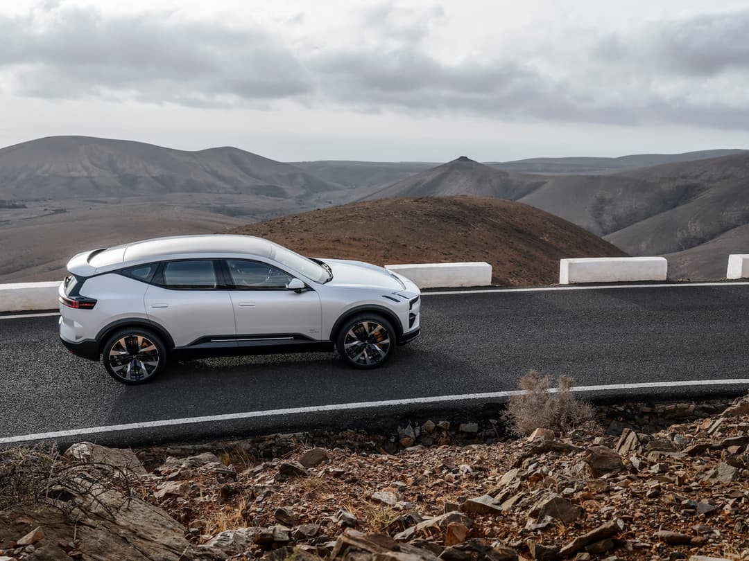 Polestar 3 EV driving on mountain road Polestar 3 EV driving on mountain road