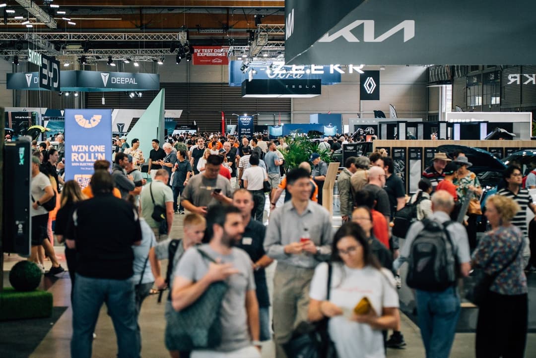 EV enthusiasts in a clean energy event EV enthusiasts in a clean energy event