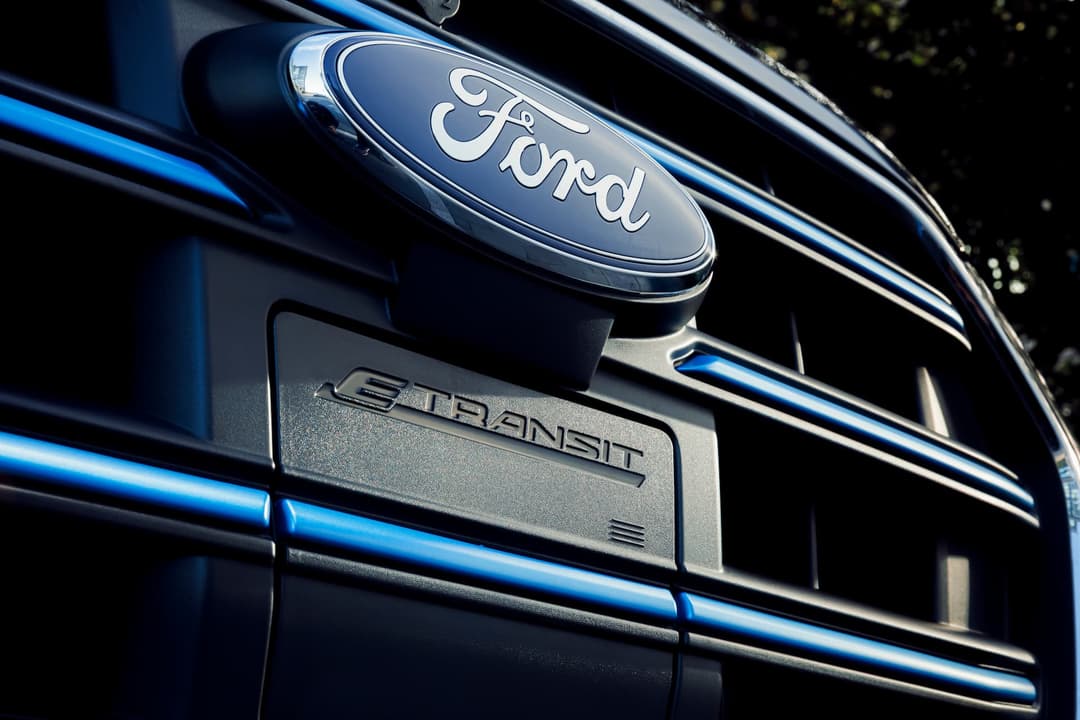 Ford and E-Transit logos on front charging port Ford and E-Transit logos on front charging port