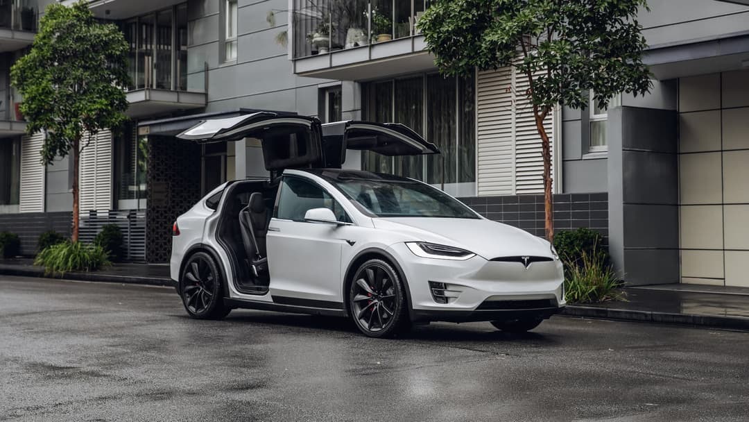 Tesla Model X and Model 3/Y at Supercharger
