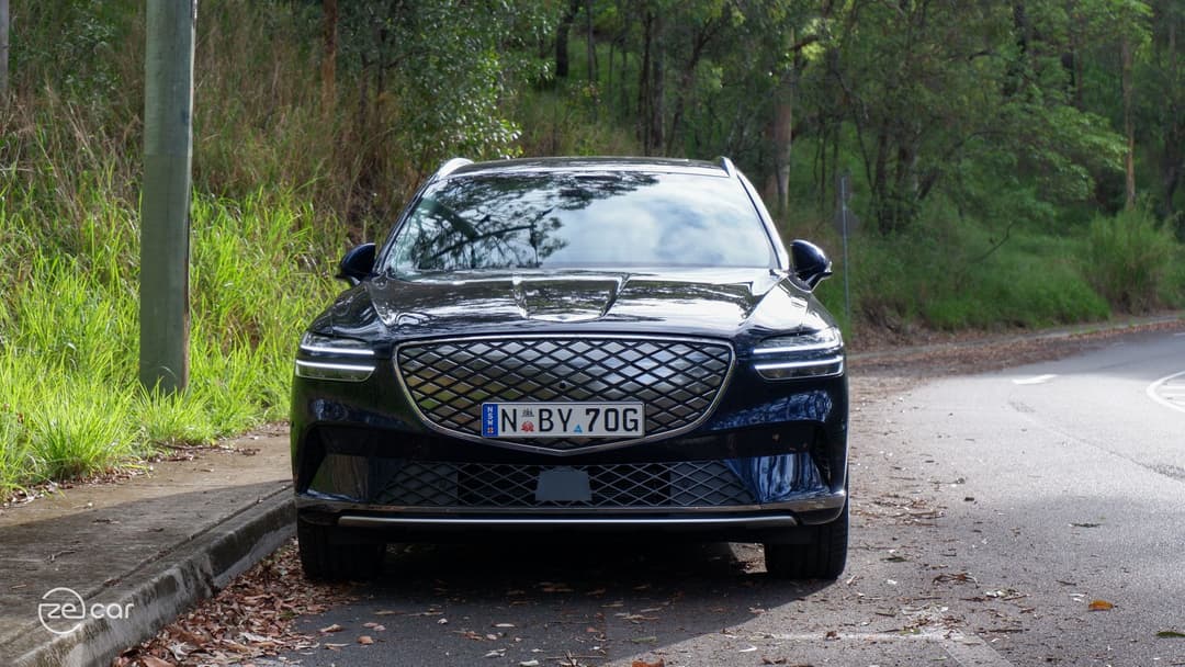Genesis Electrified GV70 front and interior driving at mountain