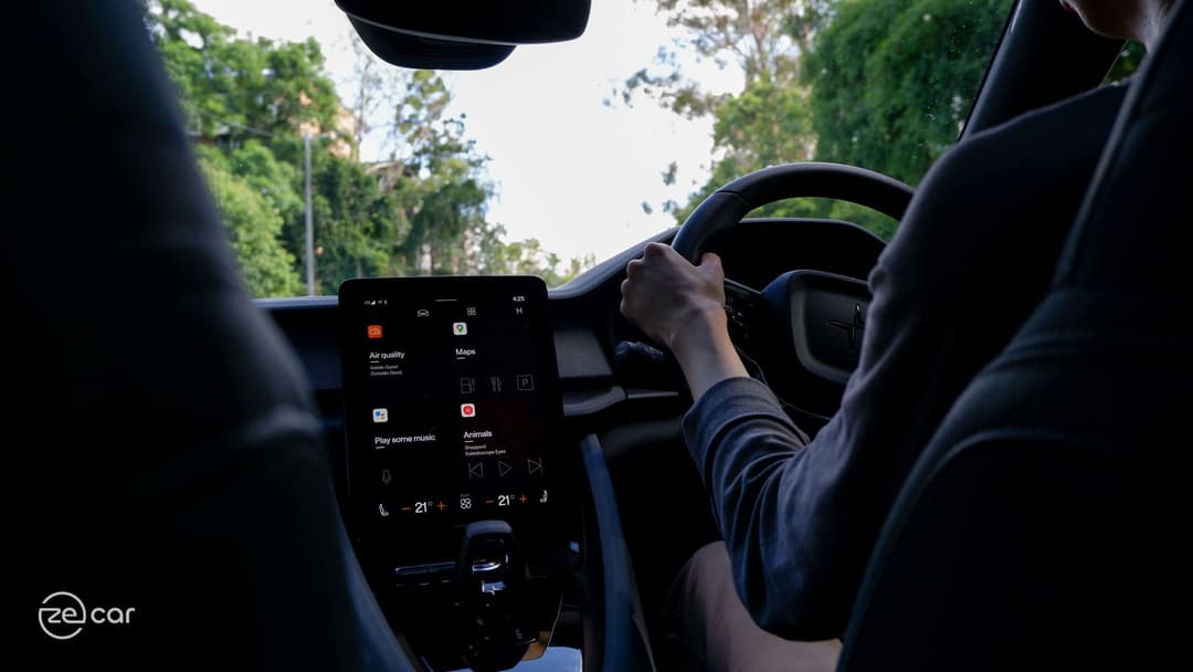 Polestar 2 front light and man driving