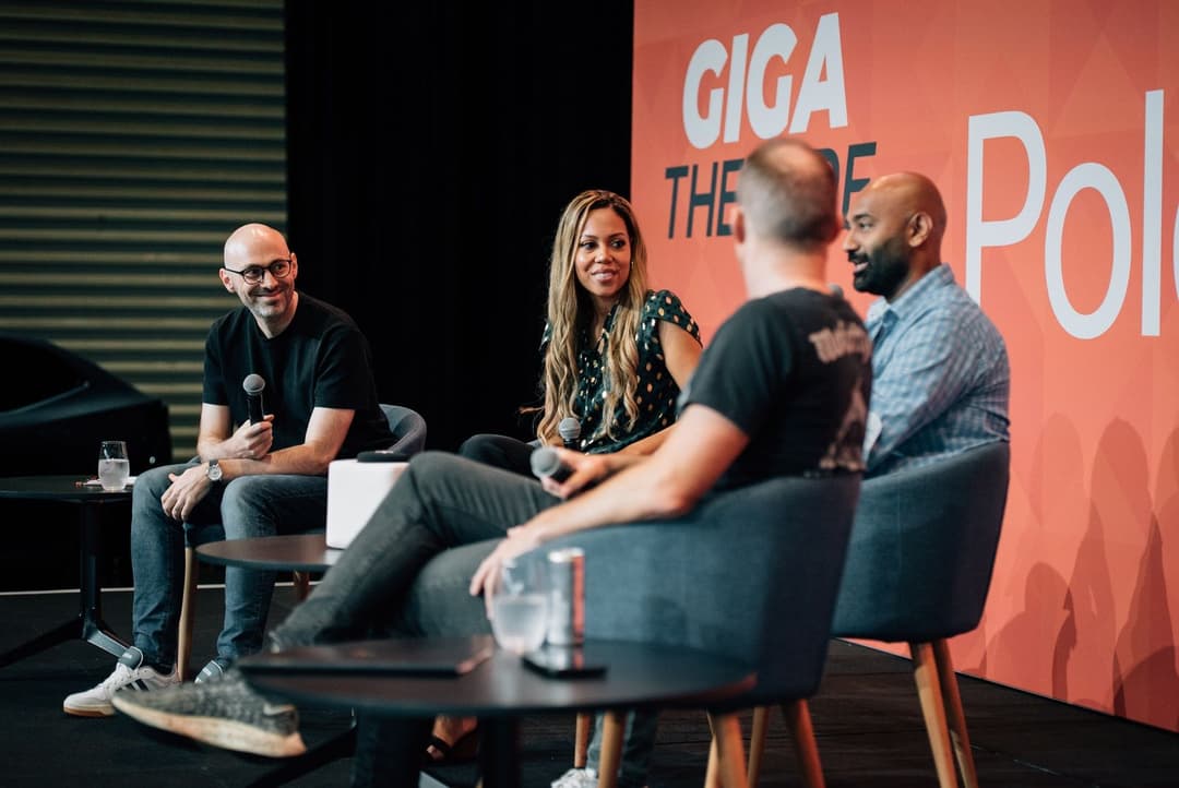 EV experts discussing on stage EV experts discussing on stage