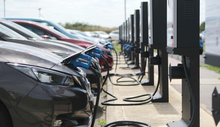 multiple EVs parked and charging multiple EVs parked and charging