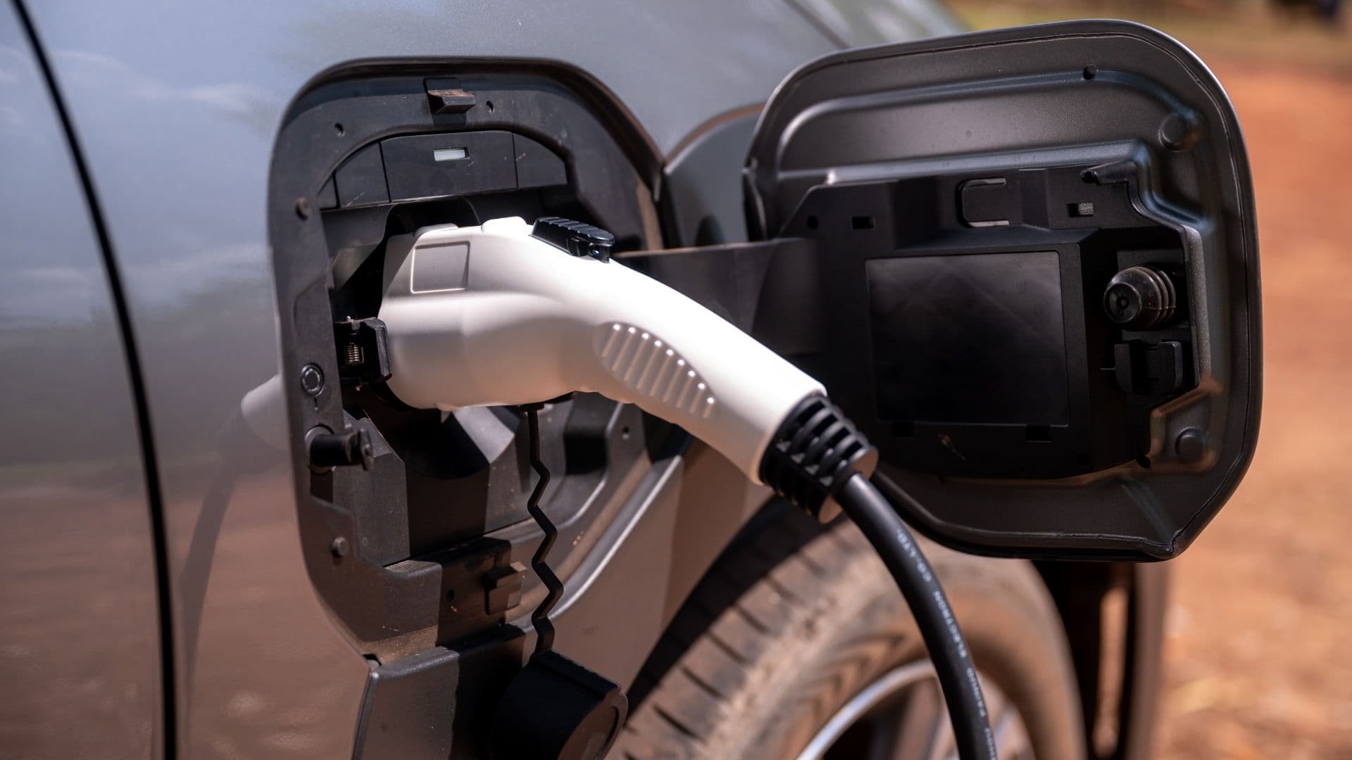 2024 Subaru Solterra charging port while being charged 2024 Subaru Solterra charging port while being charged