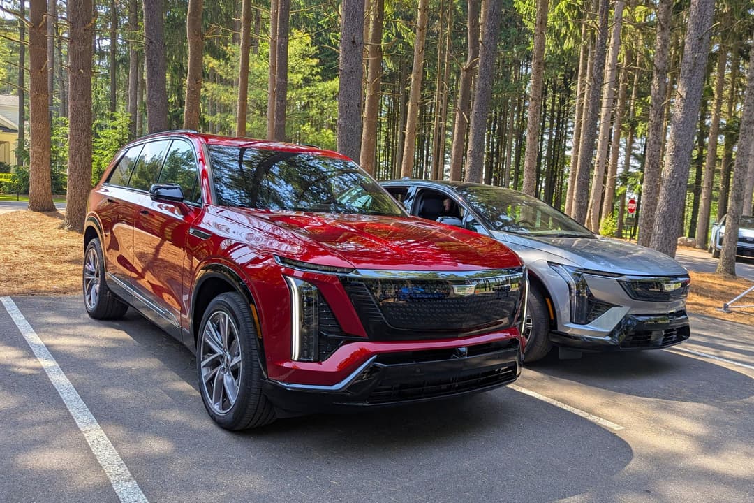 Cadillac Optiq EV side profile highlighting the mid-size electric SUV's sleek proportions and premium styling details Cadillac Optiq EV side profile highlighting the mid-size electric SUV's sleek proportions and premium styling details