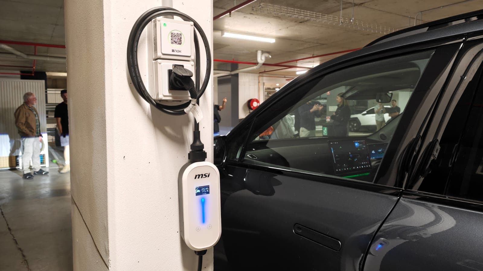 An MSI EZgo portable charger plugged into a NOX Energy Intelligent Power Socket An MSI EZgo portable charger plugged into a NOX Energy Intelligent Power Socket