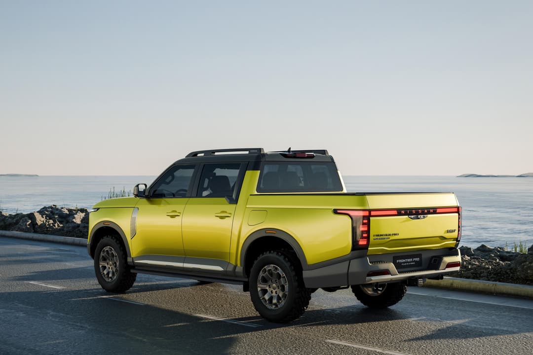 Nissan Frontier Pro PHEV side profile view highlighting the ute's muscular stance and aerodynamic body lines Nissan Frontier Pro PHEV side profile view highlighting the ute's muscular stance and aerodynamic body lines