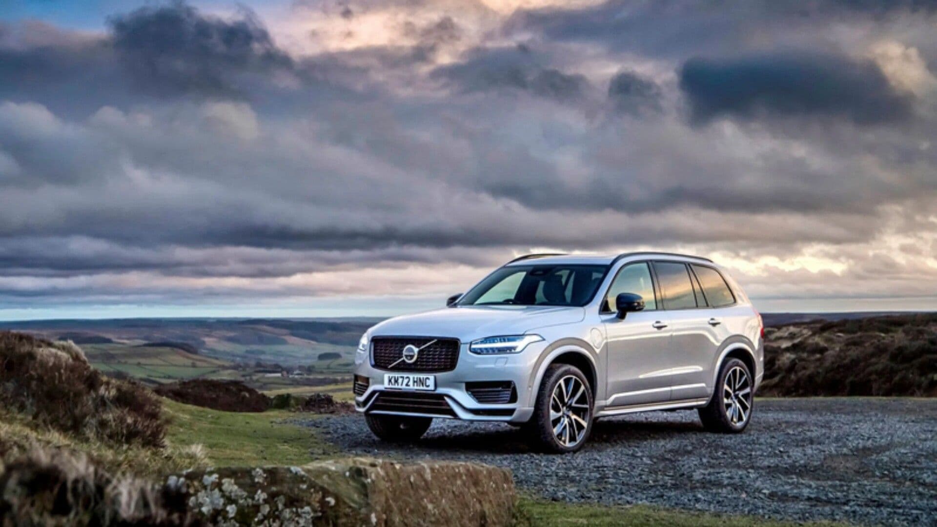 Volvo XC90 Recharge in white parked Volvo XC90 Recharge in white parked