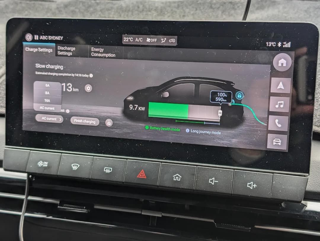 EV car screen showing battery getting charged EV car screen showing battery getting charged