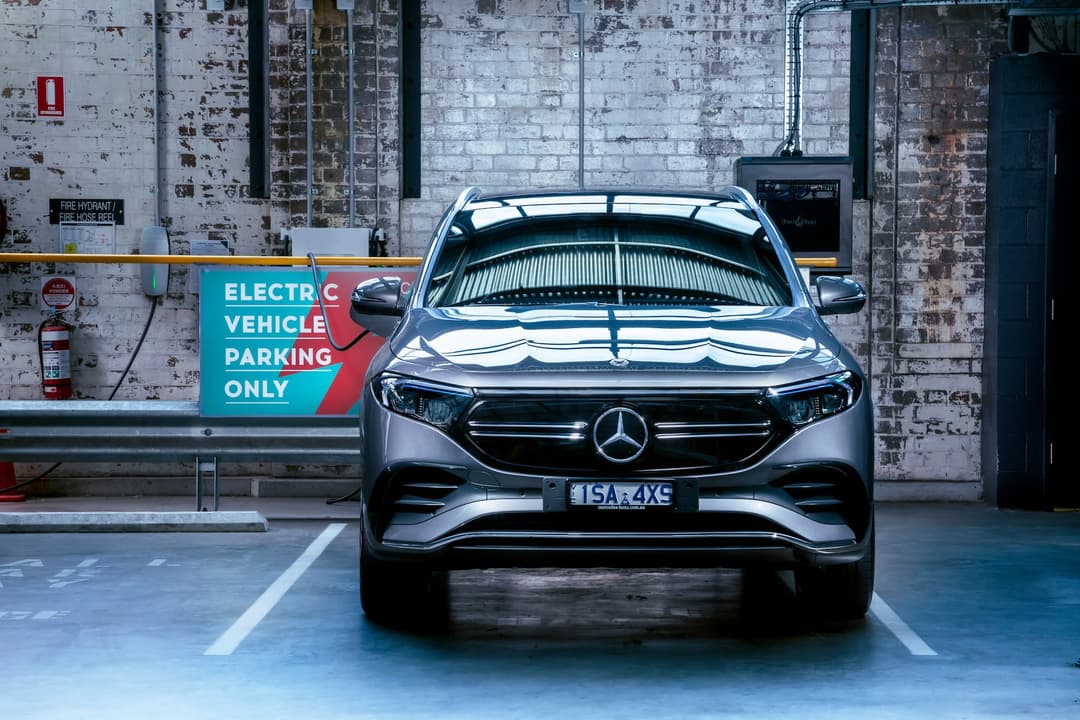 Mercedes-Benz EQA electric SUV in carpark charging spot Mercedes-Benz EQA electric SUV in carpark charging spot