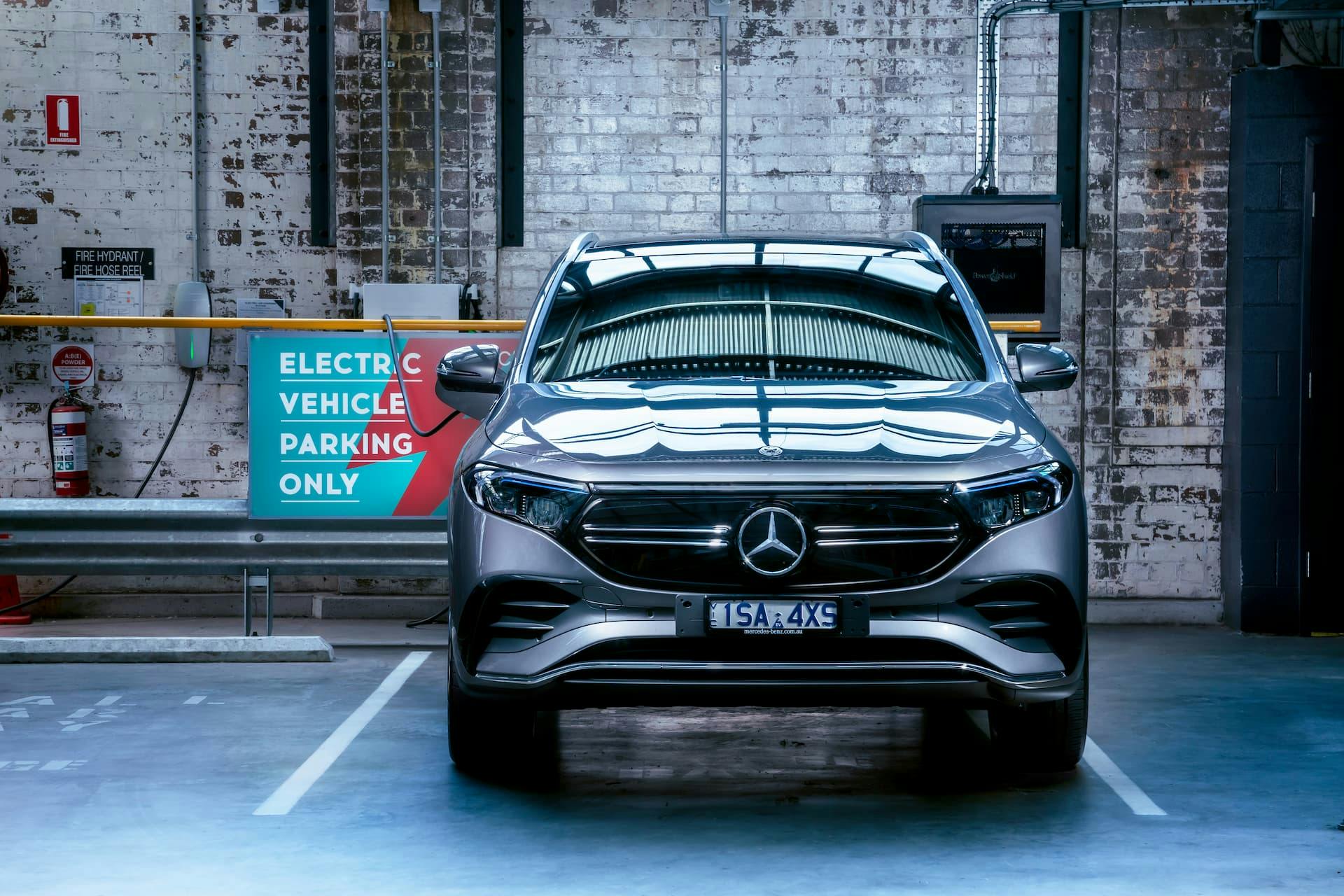 Mercedes-Benz EQA electric SUV in carpark charging spot